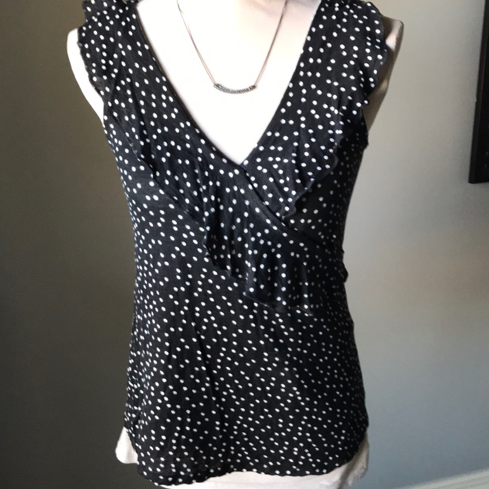 Black and white ruffle tank.